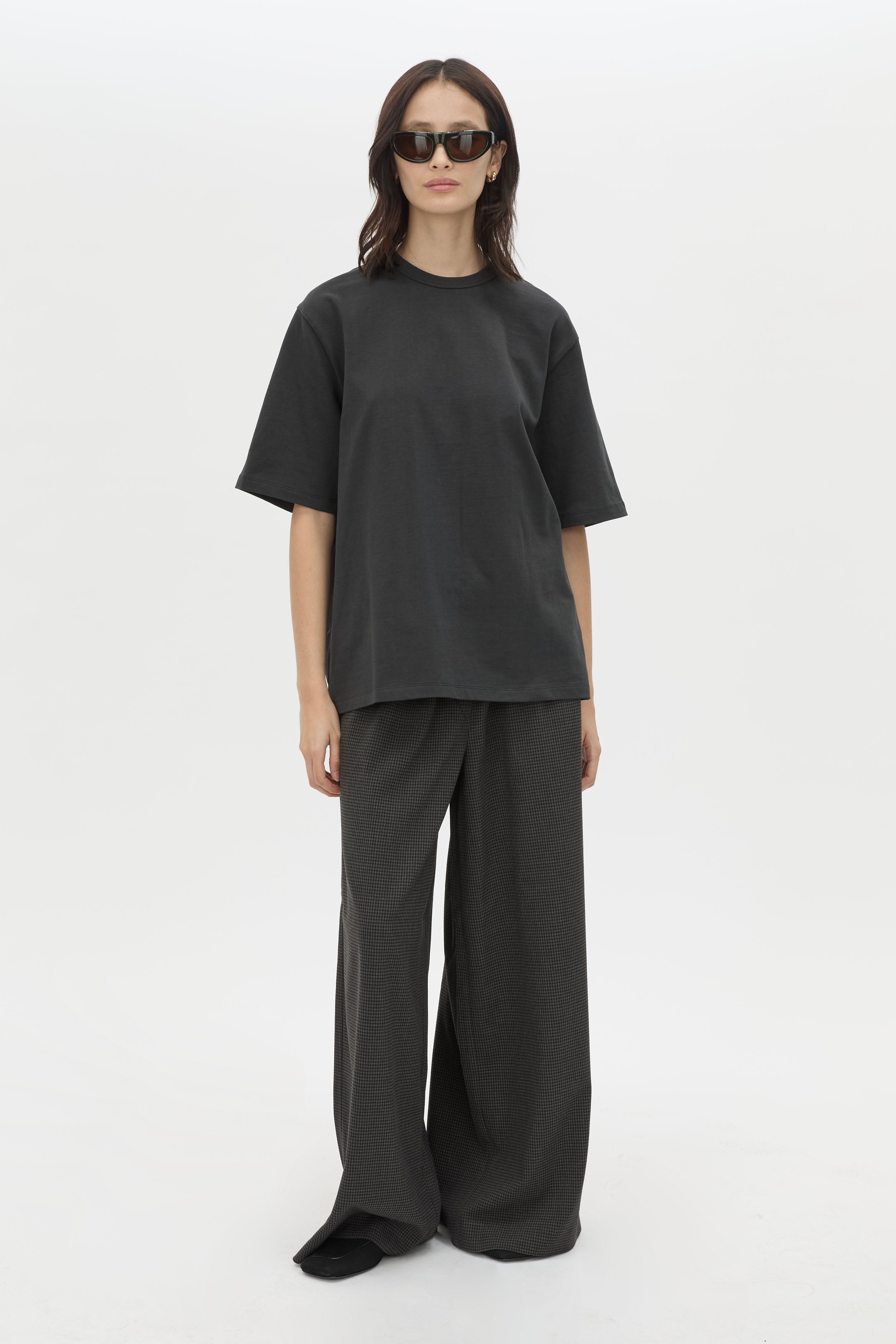 Front view CAMILLA AND MARC Studio Graphic Tee in Grey with short sleeves and boucle embroidered monogram. 