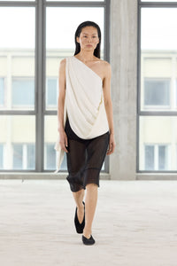 Front runway view CAMILLA AND MARC Eon Top in Cream with a draped asymmetric silhouette.