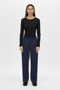 Front view CAMILLA AND MARC Barre Long Sleeve Top in Black with slim silhouette.