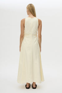 Back view CAMILLA AND MARC Brera midi dress in pale yellow with topstitch details and side pockets.