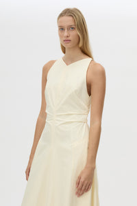 Cropped view CAMILLA AND MARC Brera midi dress in pale yellow with topstitch details and side pockets.