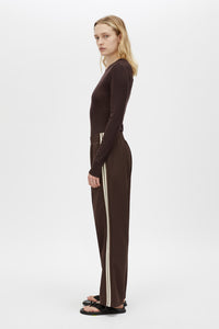 Side view CAMILLA AND MARC Locus Scuba Pant in Espresso with a mid‑rise fit and side‑stripe tape.