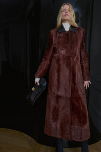 Styled view CAMILLA AND MARC Rina Coat in Chocolate Brown calf hair with contrast leather collar.