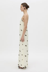 Side view CAMILLA AND MARC Adel Maxi Slip Dress with straight neckline and adjustable straps.