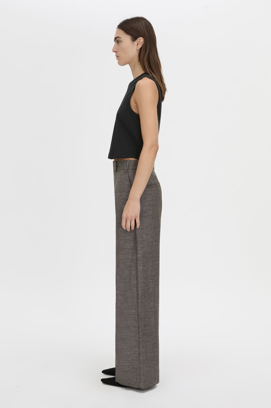 Side view CAMILLA AND MARC Alba Crop Rib Tank in black with bound low armholes and neckline.