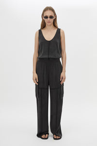 Front styled view CAMILLA AND MARC Allegro Satin Pant in Washed Black with mid‑rise cargo fit.