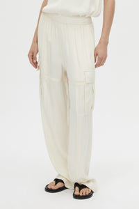 Cropped view CAMILLA AND MARC Allegro Satin Pant in Cream with mid‑rise cargo fit.