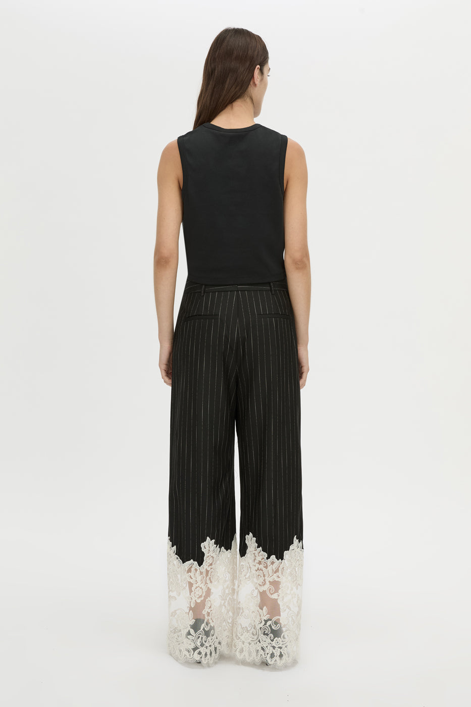 Back view CAMILLA AND MARC wide-leg Alvar Lace Pant in black and white stripe with scalloped lace hem.