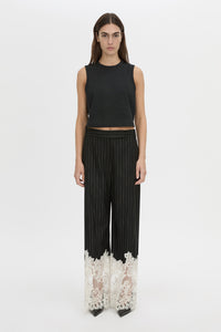 Front view CAMILLA AND MARC wide-leg Alvar Lace Pant in black and white stripe with scalloped lace hem.