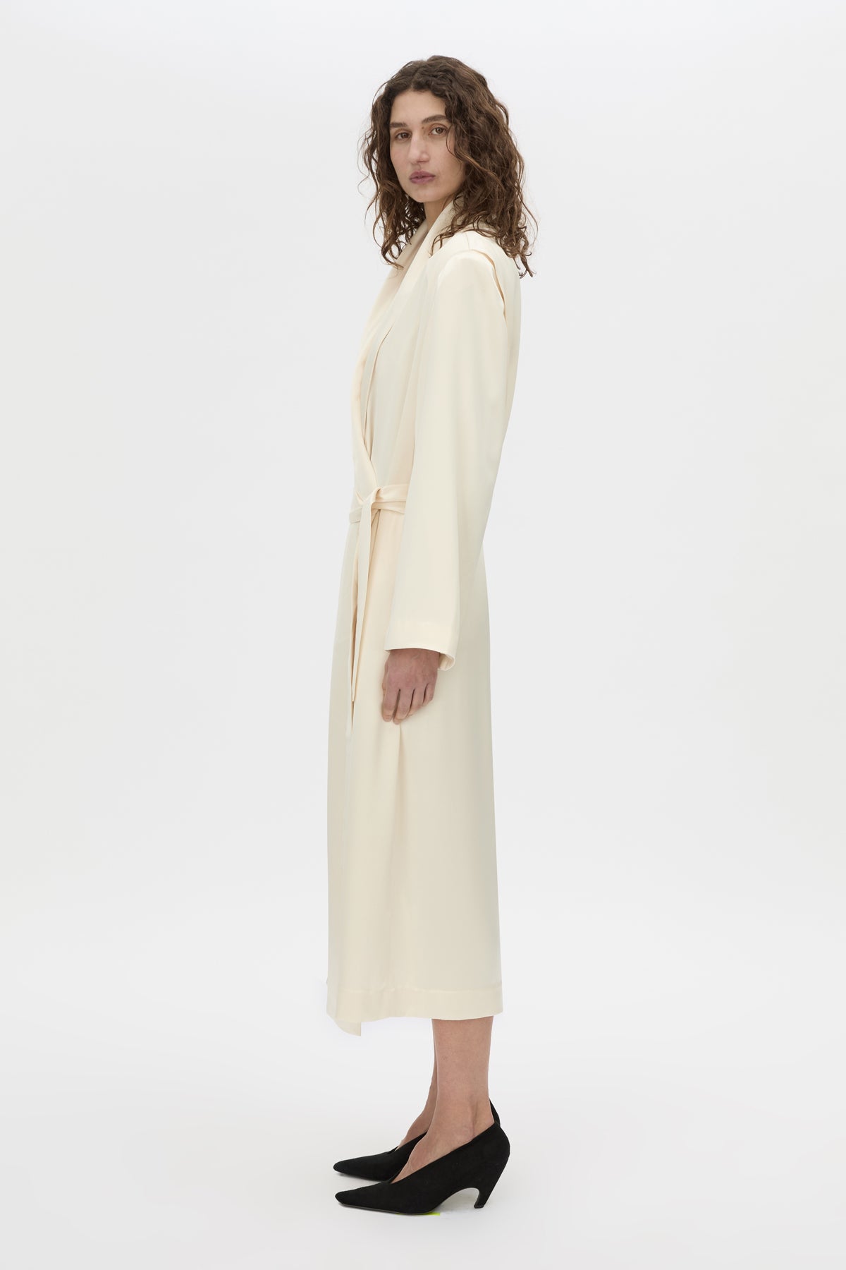 Side view CAMILLA AND MARC Arion Shawl Collar Dress in cream with wrapped robe-style design.