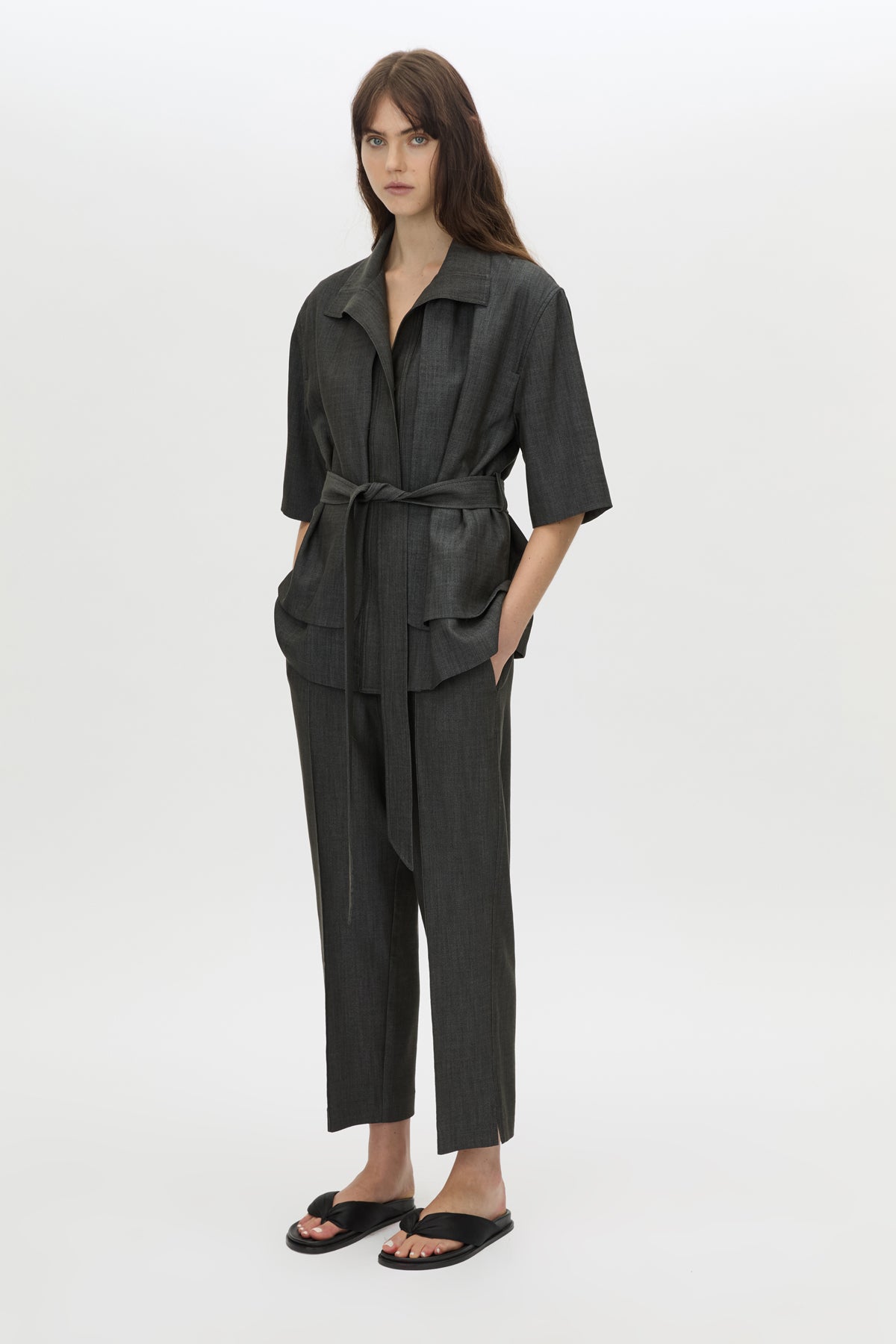 Three-quarter view CAMILLA AND MARC cropped Arlowe Short Sleeve Jacket in denim navy.