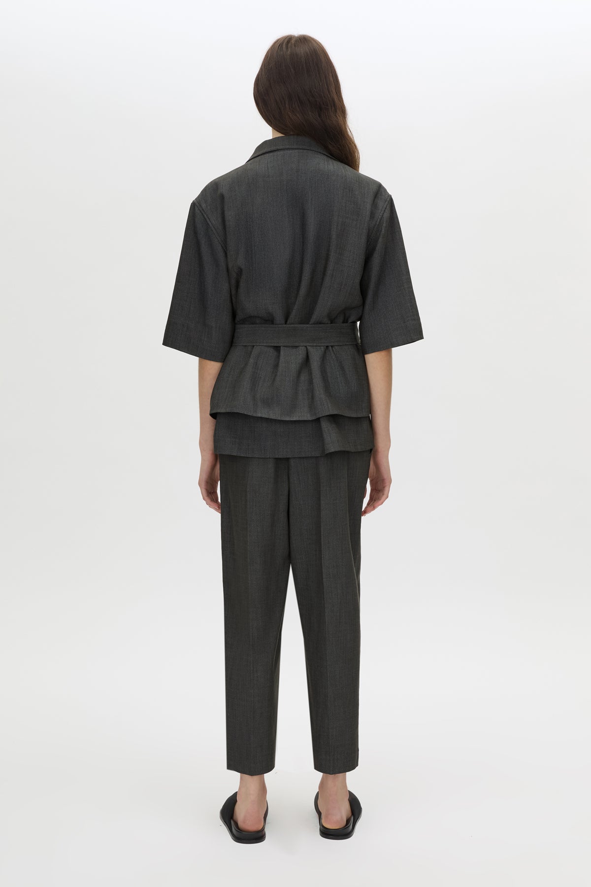 Back view CAMILLA AND MARC cropped Arlowe Short Sleeve Jacket in denim navy.
