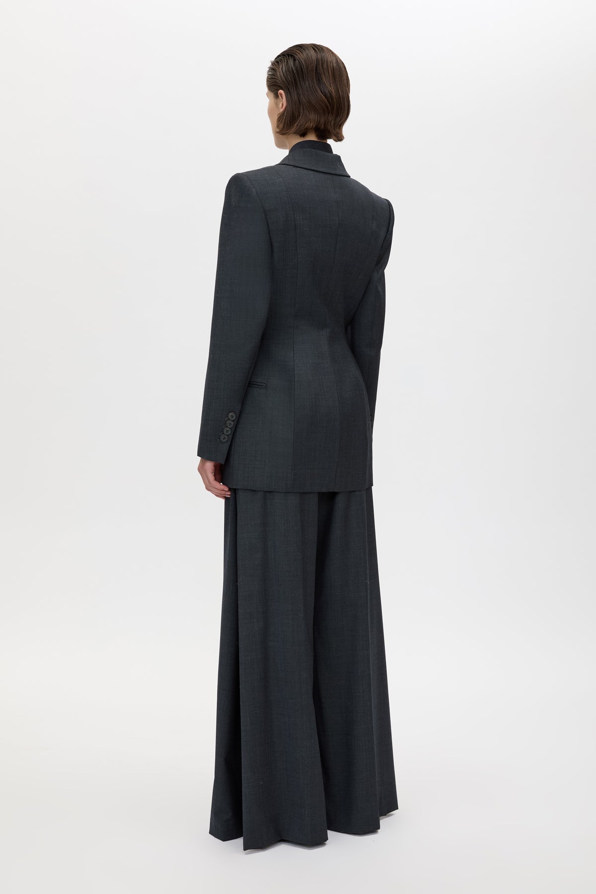 Back view CAMILLA AND MARC Ascent Fitted Hourglass Blazer in Dark Grey with contrast undercollar and 100% wool tailoring.