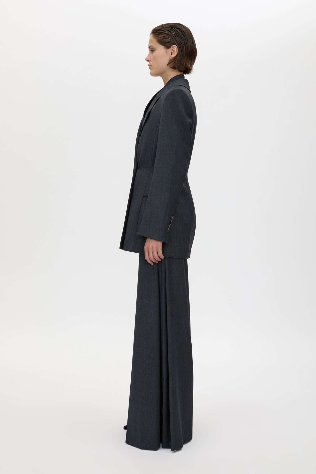 Side view CAMILLA AND MARC Ascent Fitted Hourglass Blazer in Dark Grey with contrast undercollar and 100% wool tailoring.