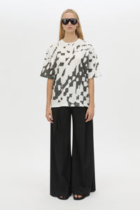 Front styled view CAMILLA AND MARC Asper Print Tee in Soft White with oversized short‑sleeve silhouette and printed artwork. 