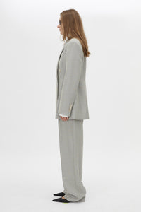 Side view CAMILLA AND MARC Aspira Blazer in Dusty Blue with a draped double‑breasted wool silhouette.
