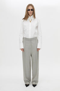 Front styled view CAMILLA AND MARC Aspira Pant in Dusty Blue with a wide‑leg tailored silhouette.
