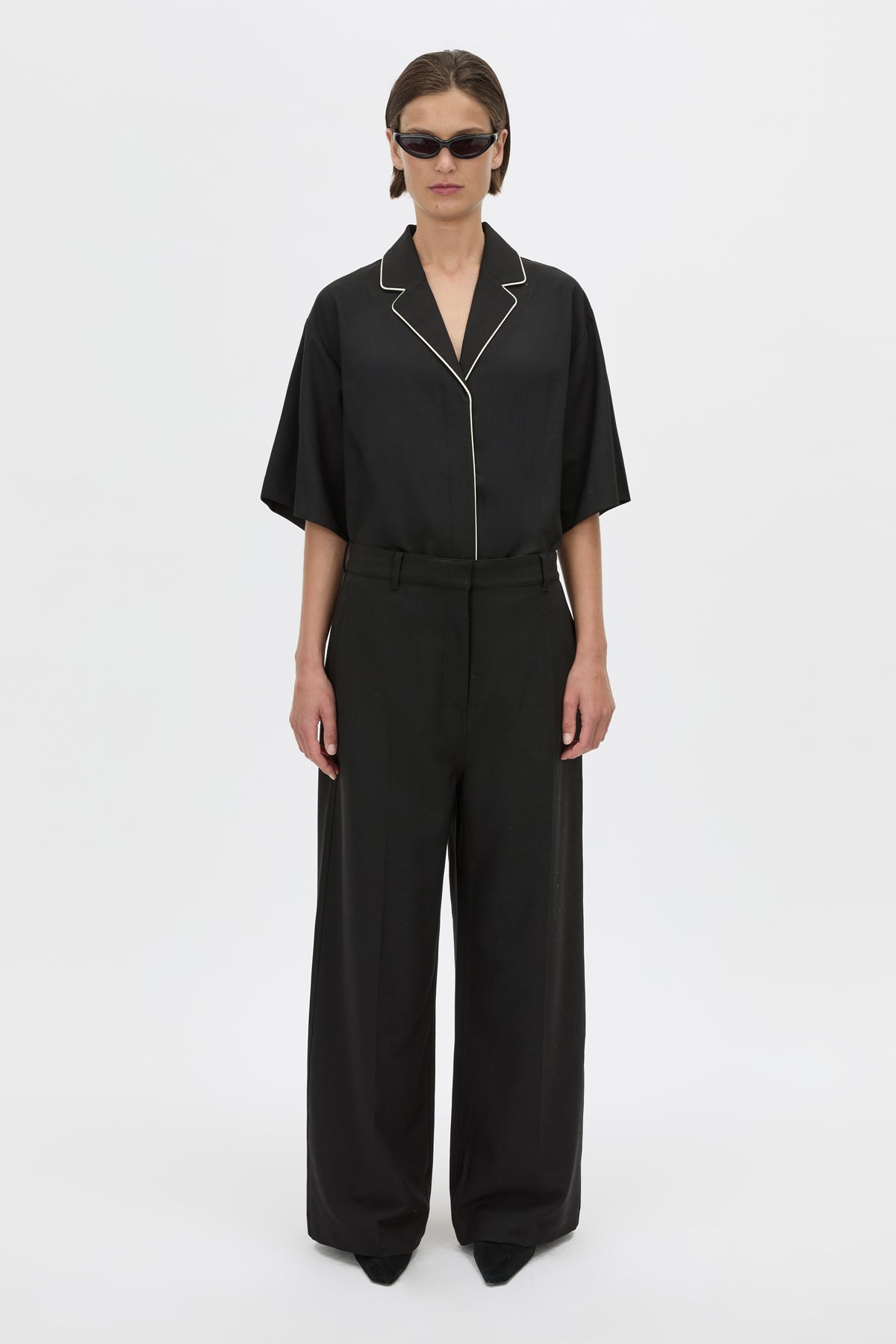 Front View - CAMILLA AND MARC Atticus Pant in black with a low-rise, wide leg silhouette. 