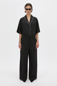 Front View - CAMILLA AND MARC Atticus Pant in black with a low-rise, wide leg silhouette. 
