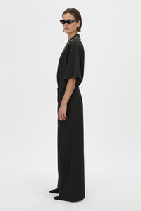 Side View - CAMILLA AND MARC Atticus Pant in black with a low-rise, wide leg silhouette. 