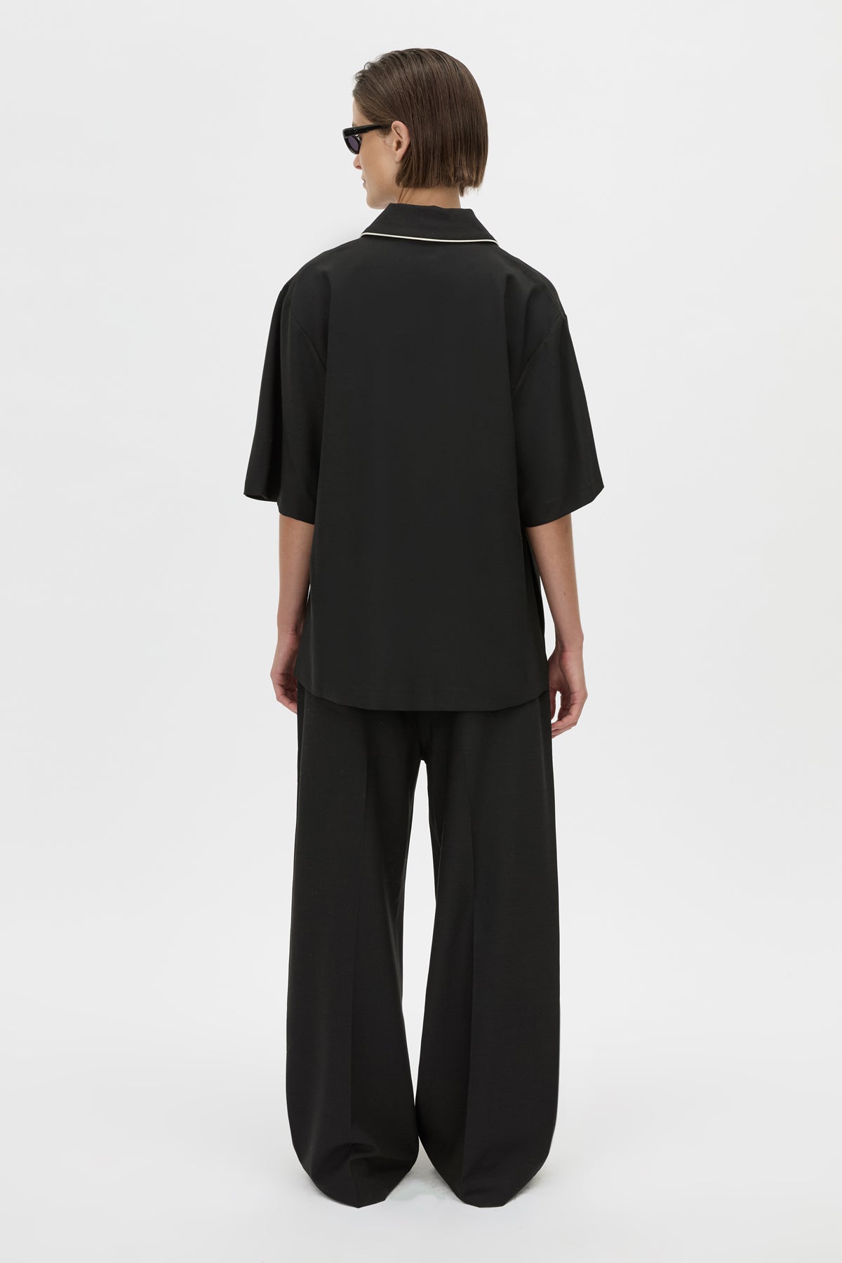 Back View - CAMILLA AND MARC collared Atticus Short Sleeve Shirt in black with contrast cord piping. 