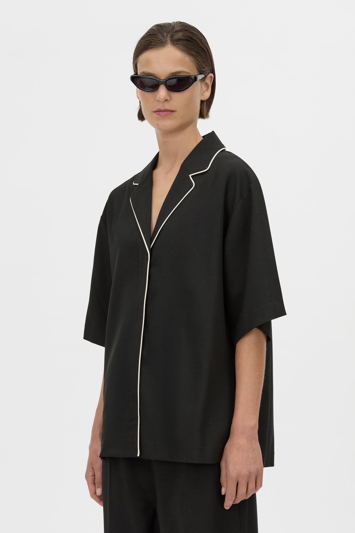 Detail View - CAMILLA AND MARC collared Atticus Short Sleeve Shirt in black with contrast cord piping. 