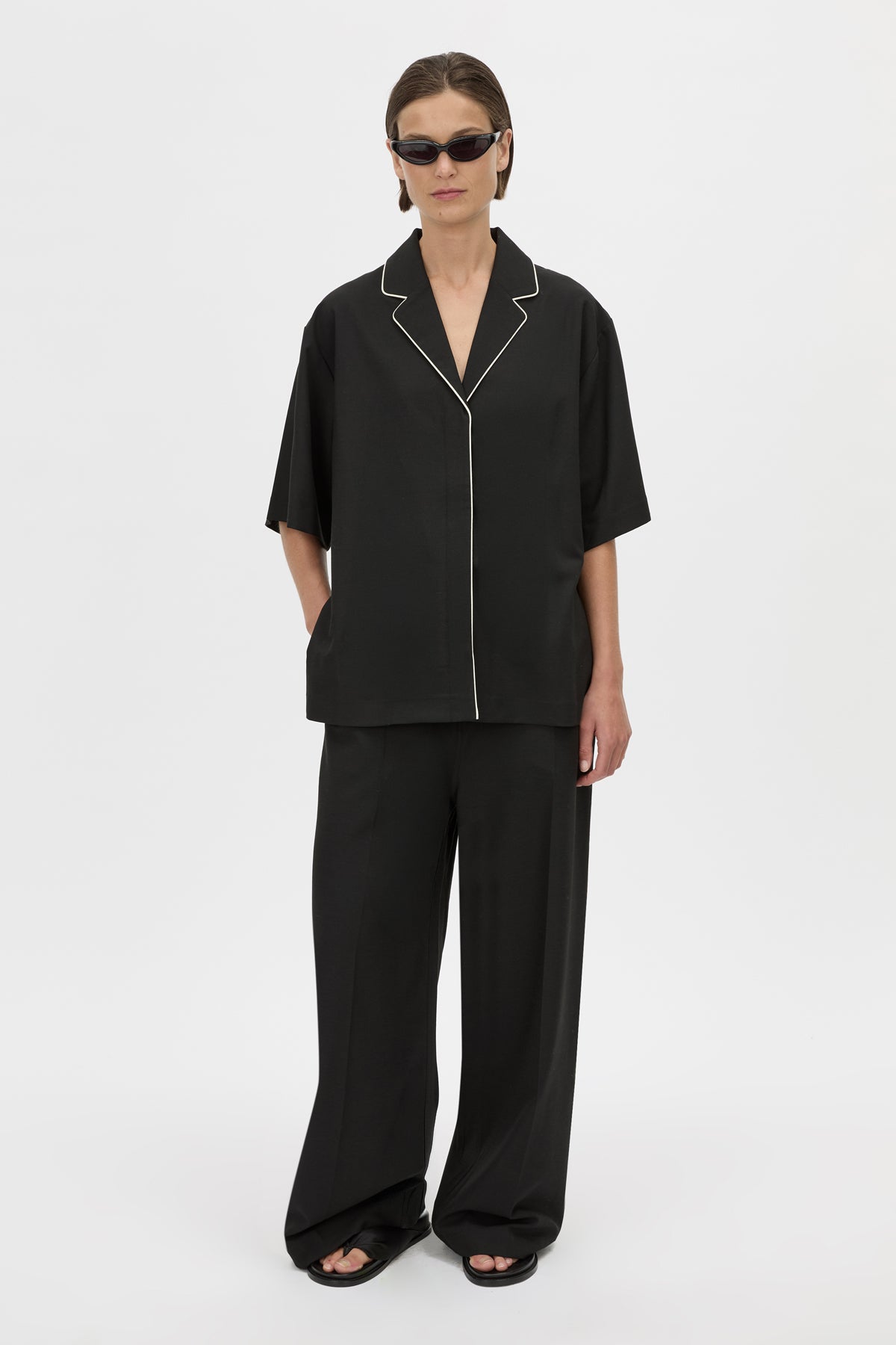 Front View - CAMILLA AND MARC collared Atticus Short Sleeve Shirt in black with contrast cord piping. 