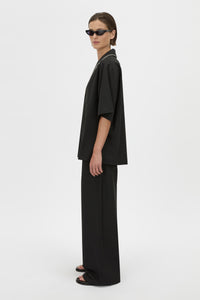 Side View - CAMILLA AND MARC collared Atticus Short Sleeve Shirt in black with contrast cord piping. 
