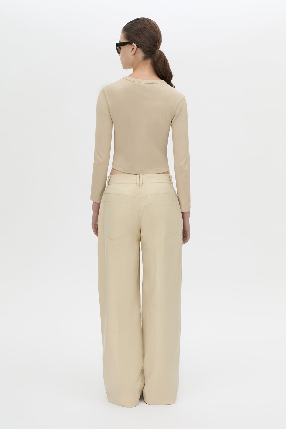 Back view CAMILLA AND MARC Aubrey Long Sleeve Rib Top in Latte with a contrast corozo button placket.