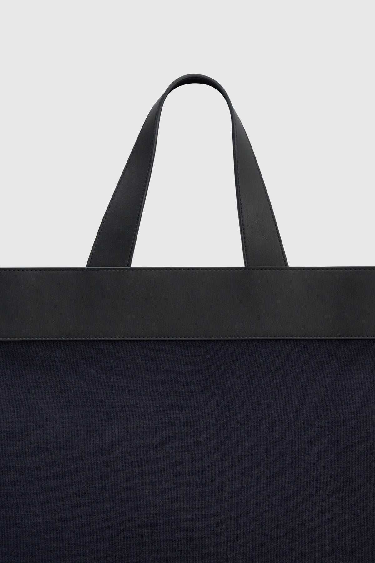 Cropped view CAMILLA AND MARC August Tote Bag in navy with black trim in cotton-linen canvas.