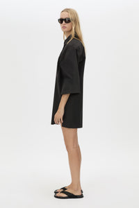 Side View CAMILLA AND MARC Avant collared black shirt dress with front symmetric pleat details. 