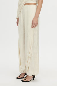Cropped view CAMILLA AND MARC Avis Pant in cream with wide-leg balloon design.