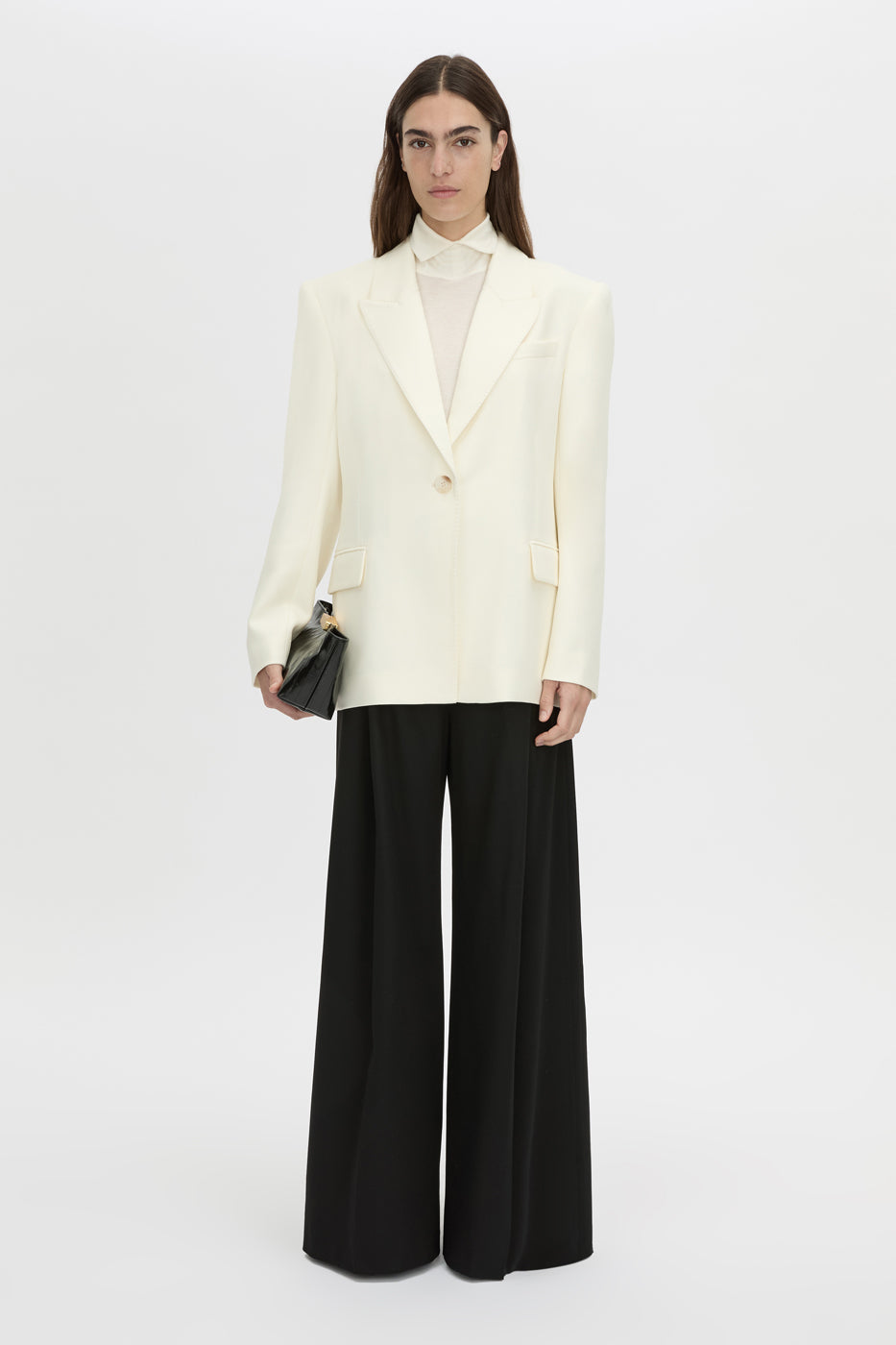 Front-styled view CAMILLA AND MARC Barre turtleneck long-sleeve top in soft white.