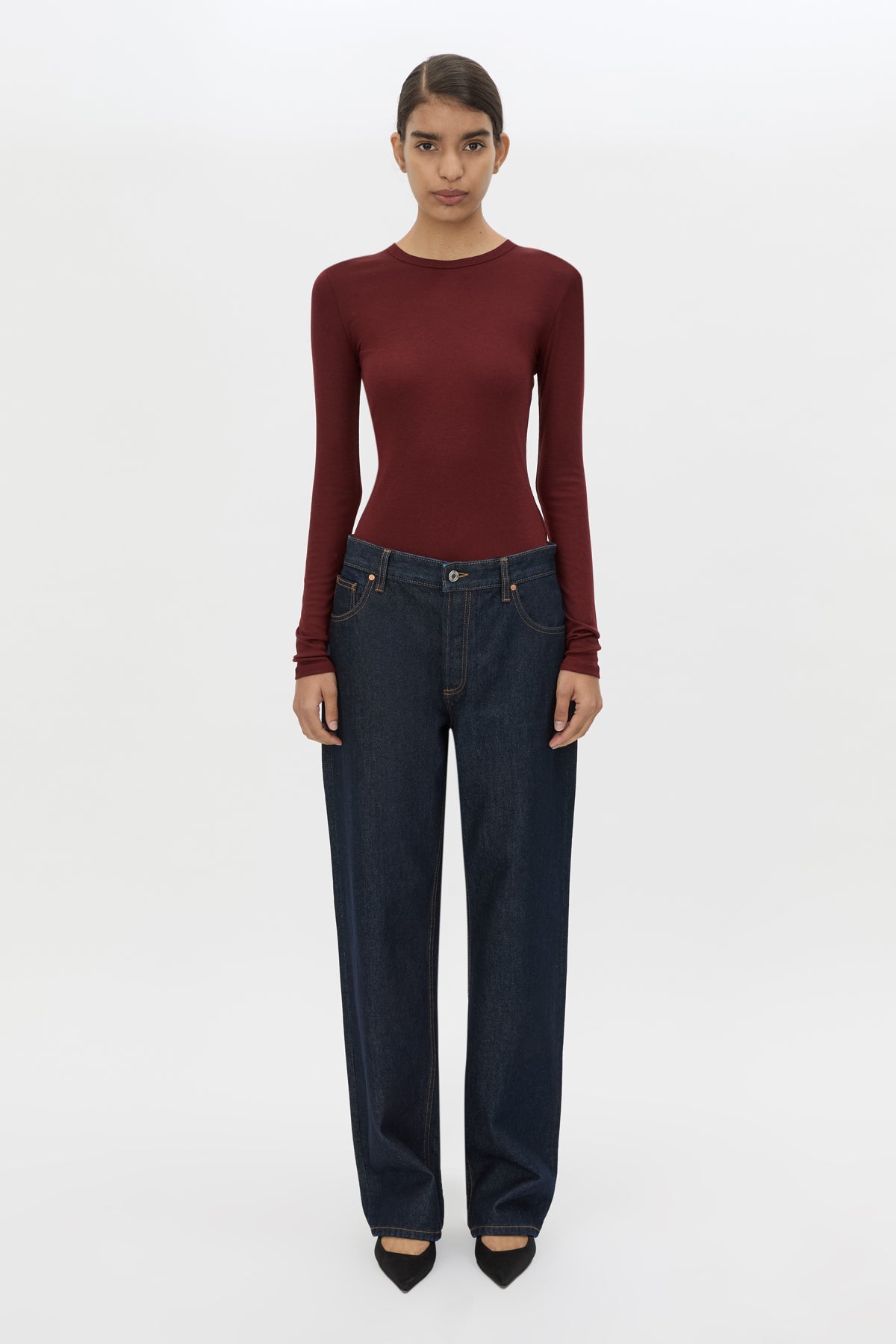Front view CAMILLA AND MARC Barre Long Sleeve Top in Burgundy styled with the Manuela Denim Jean.