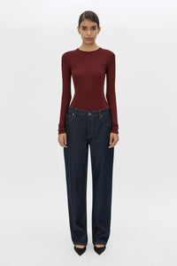 Front view CAMILLA AND MARC Barre Long Sleeve Top in Burgundy styled with the Manuela Denim Jean.