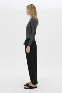 Side view CAMILLA AND MARC Beau Tapered Crop Pant in Black with elasticated waistband.