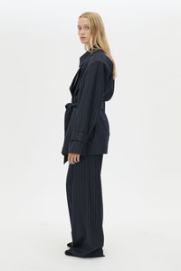 Side view CAMILLA AND MARC Brody Short Trench Coat in Navy Stripe with a relaxed silhouette.