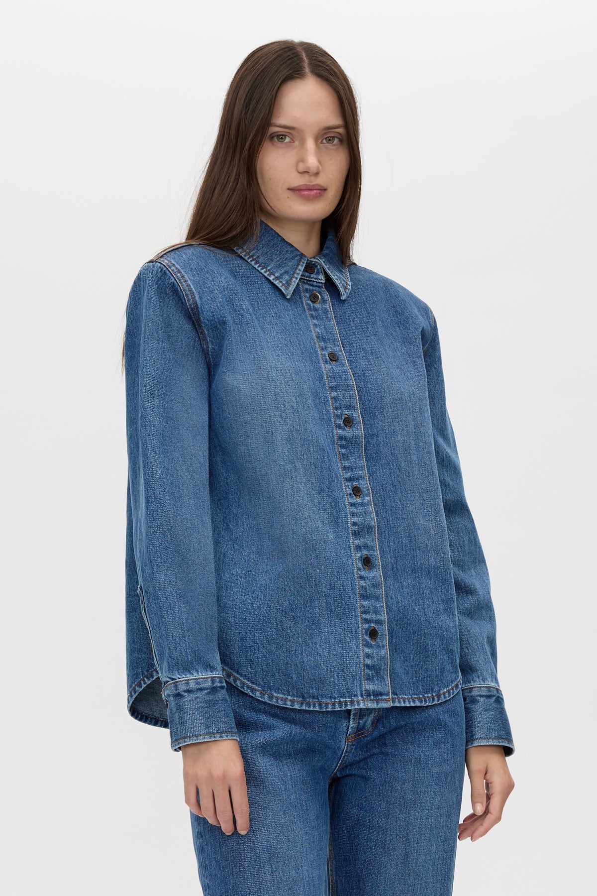 Cropped view CAMILLA AND MARC Caden Denim Shirt in Dark Classic Blue with shoulder pads and an embroidered monogram.