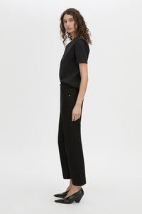 Side view CAMILLA AND MARC short sleeve Carmen Shoulder Pad Tee in black with strong shoulder design. 