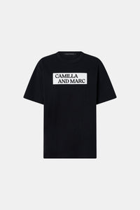 Ghost view CAMILLA AND MARC Carmont Graphic Tee in Black with white graphic logo.
