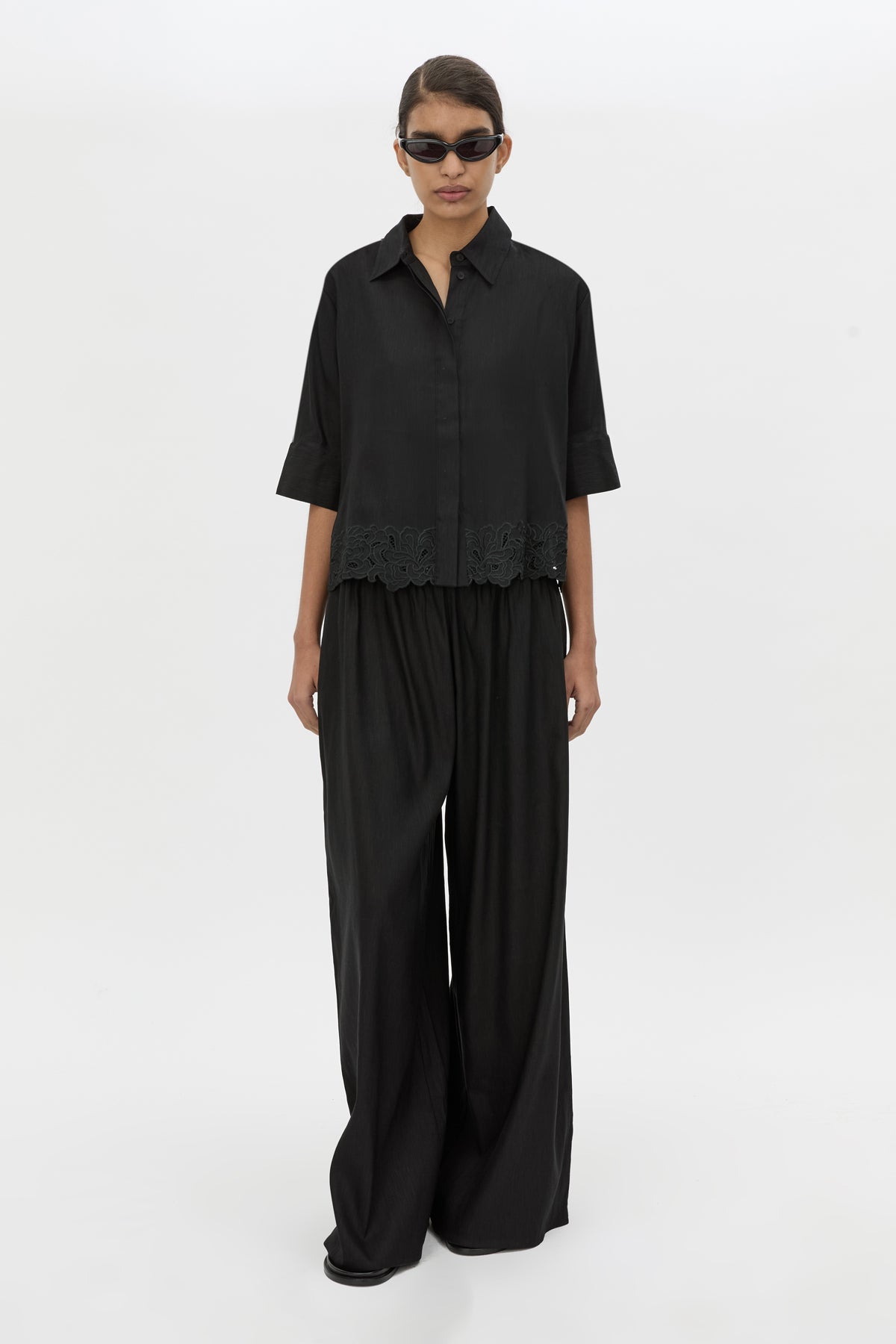 Front view CAMILLA AND MARC Chara Embroidered Relaxed Pant in Black with encased elastic waistband.