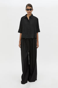 Front view CAMILLA AND MARC Chara Embroidered Relaxed Pant in Black with encased elastic waistband.