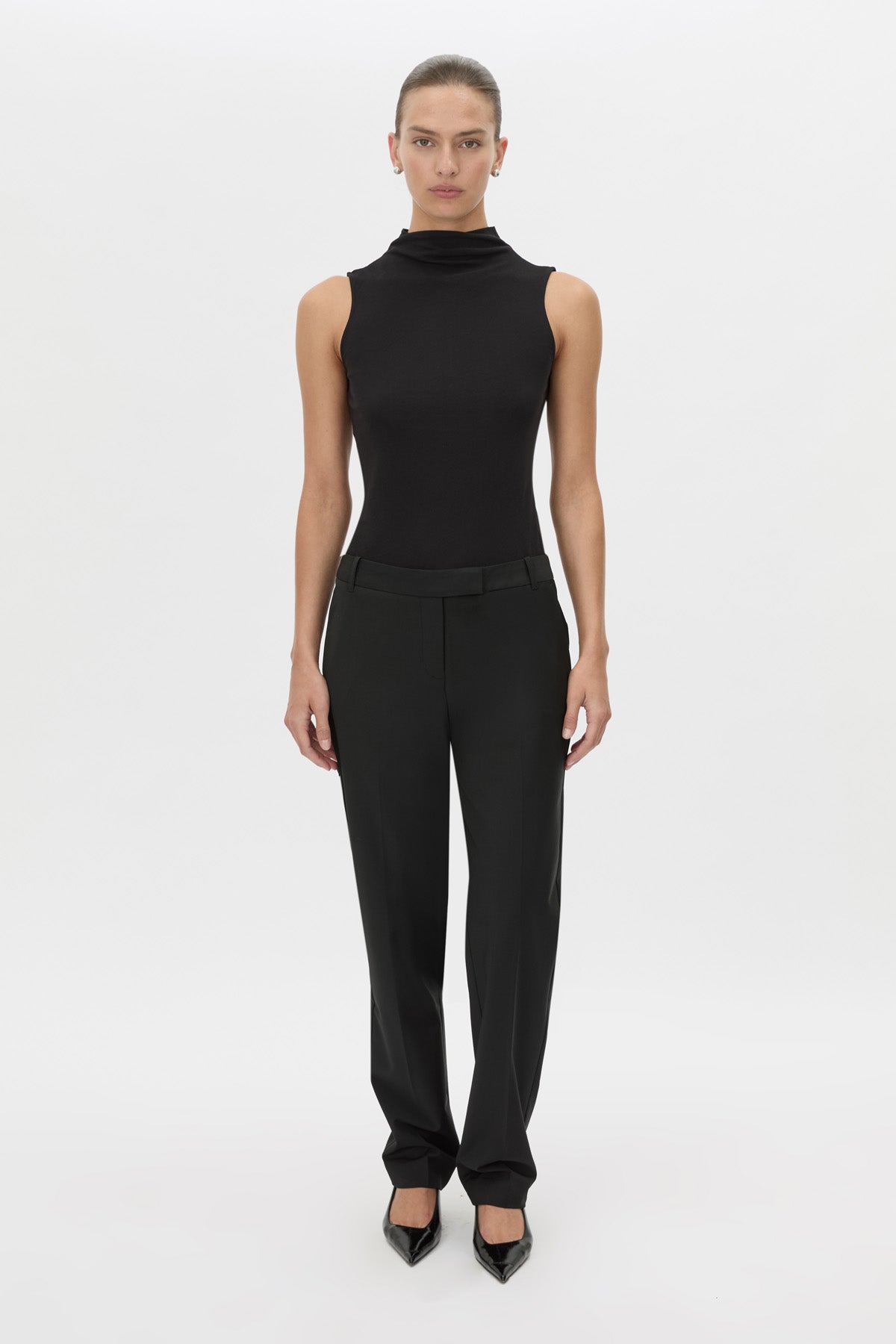 Front view CAMILLA AND MARC Chiaro Slim-Fit Pant in black with low‑waisted, tailored waistband.