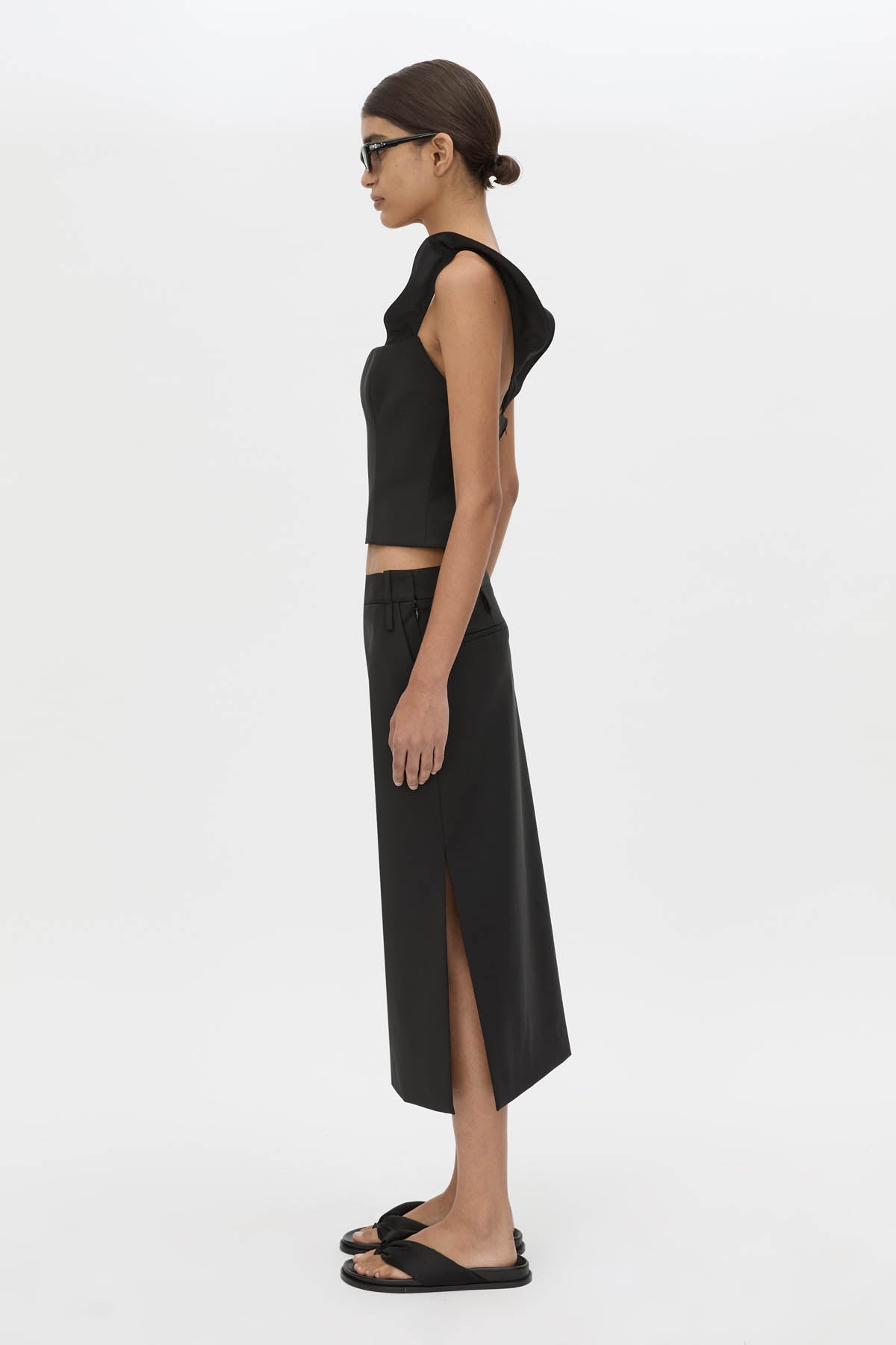 Side view CAMILLA AND MARC Chiaro Tailored Top in black with fluted ruffle straps.