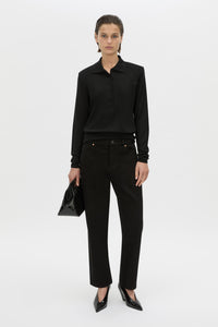 Front-2 view CAMILLA AND MARC Chime long-sleeve merino wool knit polo top in black.