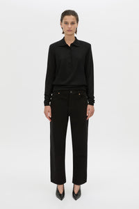 Front-styled-3 view CAMILLA AND MARC Chime long-sleeve merino wool knit polo top in black.