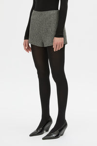 Cropped view CAMILLA AND MARC high waisted Cinder Mini Short in charcoal grey with invisible side seam closure.