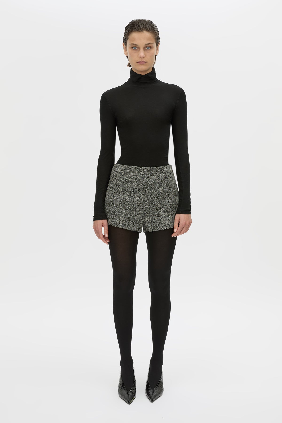 Front view CAMILLA AND MARC high waisted Cinder Mini Short in charcoal grey with invisible side seam closure.