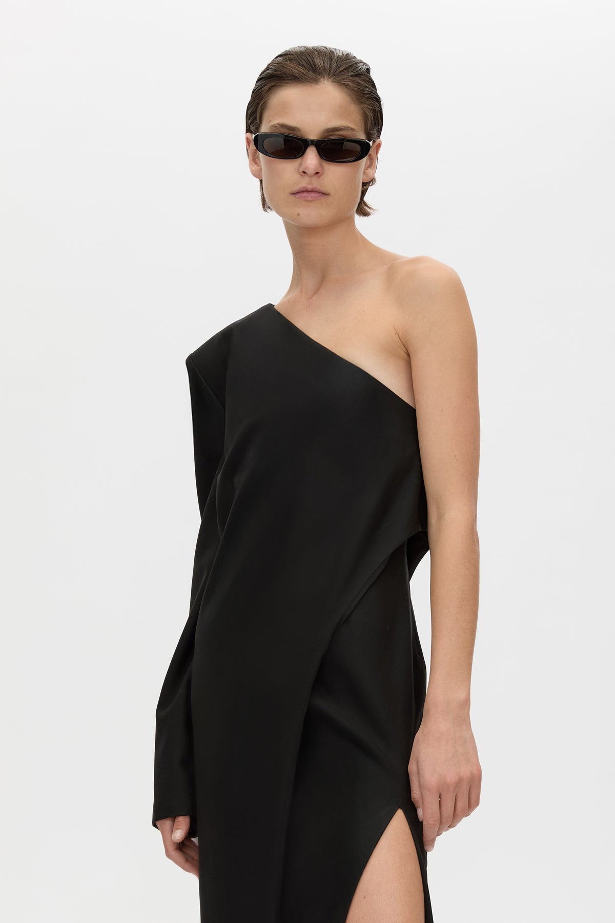 Cropped view CAMILLA AND MARC Ciran Asymmetric Maxi Dress in Black with one‑shoulder padded detail and 100% wool fabrication.