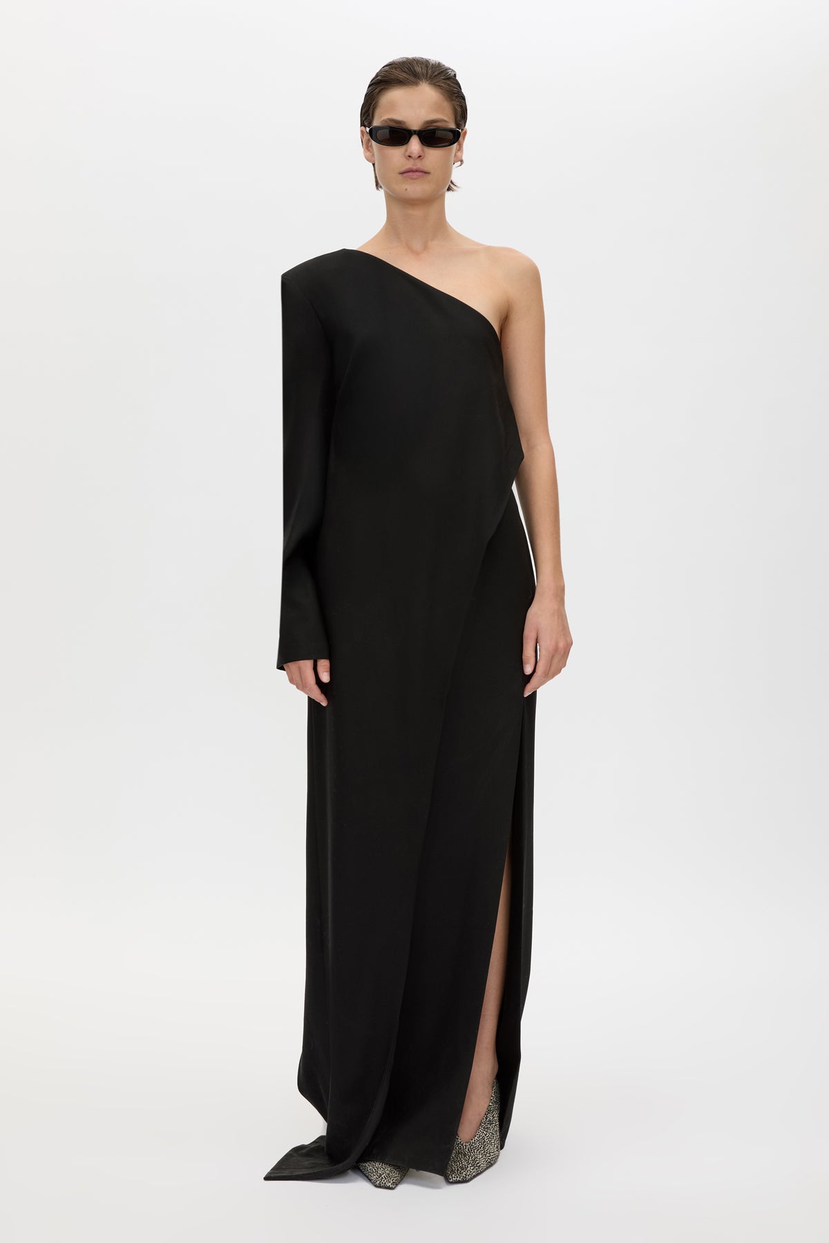 Front view CAMILLA AND MARC Ciran Asymmetric Maxi Dress in Black with one‑shoulder padded detail and 100% wool fabrication.